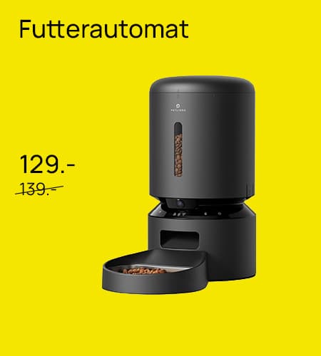 Futterautomat 129.- statt 139.- – schwarzer Futterautomat mit gefüllter Futterschale auf gelbem Hintergrund